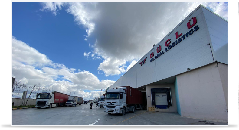 Güçlü Global Lojistik tesisinin dış cephesi ve yükleme alanı